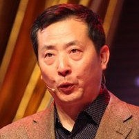 傅百良